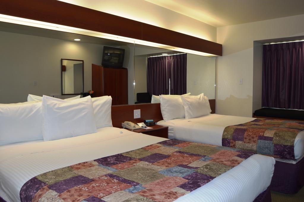 Microtel Inn And Suites By Wyndham Miami Ok Habitación foto